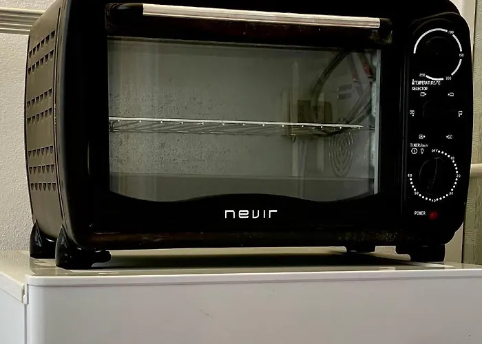 Cozy And Sunny Over The Rooftops *